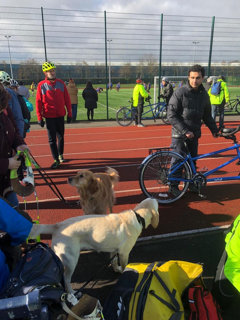 Toseef's dog Poppy looking at Toseef. If she could talk she'd be asking "Why can't I have a go?"